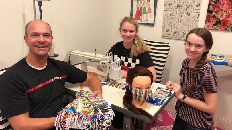 Allie Lunt, middle, has spent more than 20 hours sewing face masks for health care workers and first responders.