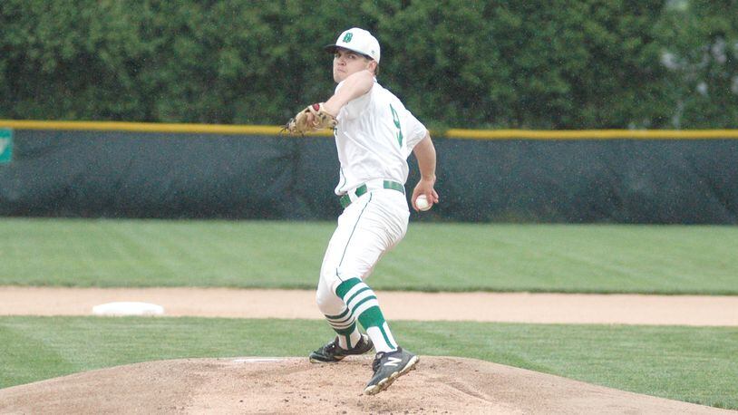 Badin pitcher Shawn Osborne prepares to deliver a pitch to the plate during Saturday's 9-7 win over visiting Hamilton at Alumni Field. RICK CASSANO/STAFF