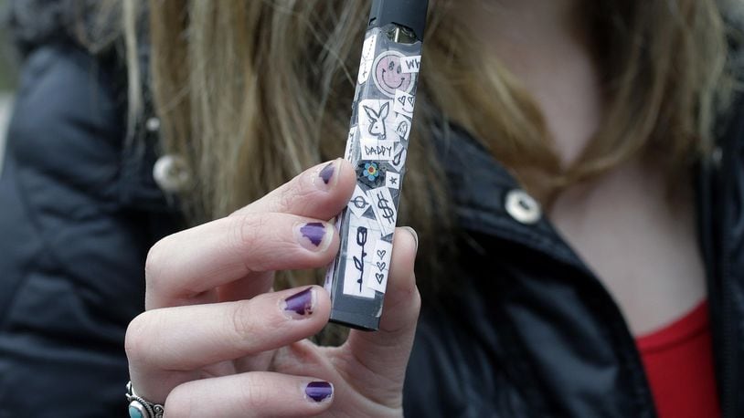 E-cigarette cartridges such as this one can easily be concealed because they are less than 4 inches long and resemble a flash drive. ASSOCIATED PRESS