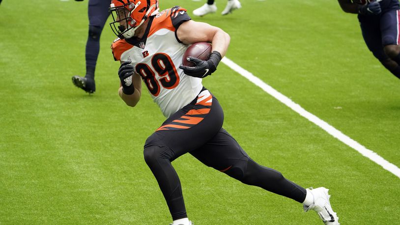 Cincinnati Bengals tight end Drew Sample (89) scores a touchdown after catching a pass against the Houston Texans during the first half of an NFL football game Sunday, Dec. 27, 2020, in Houston. (AP Photo/Sam Craft)