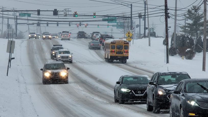 Snow blanketed Butler County causing slick roads and school closings. NICK GRAHAM / STAFF