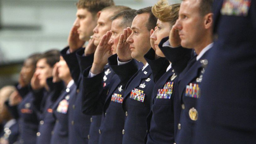 FILE: In 2008 U.S. Air Force personnel who work at the National Air and Space Intelligence Center (NASIC) make their first salute to incoming NASIC Commander Co. D. Scott George during a change of command ceremony at the National Museum of the United States Air Force on Tuesday, June 17, 2008. Col. George assumed command from Col. Karen A. Cleary. The commander in 2019 Col. Parker H. Wright. Staff photo by Ty Greenlees