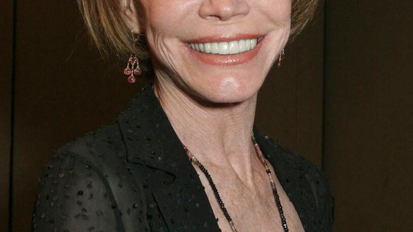 FILE - This Sept. 19, 2015, file photo shows Mary Tyler Moore at the 26th Annual News and Documentary Emmy Awards ceremony in New York. Moore died Wednesday, Jan. 25, 2017, at age 80. (AP Photo/Tina Fineberg, File)