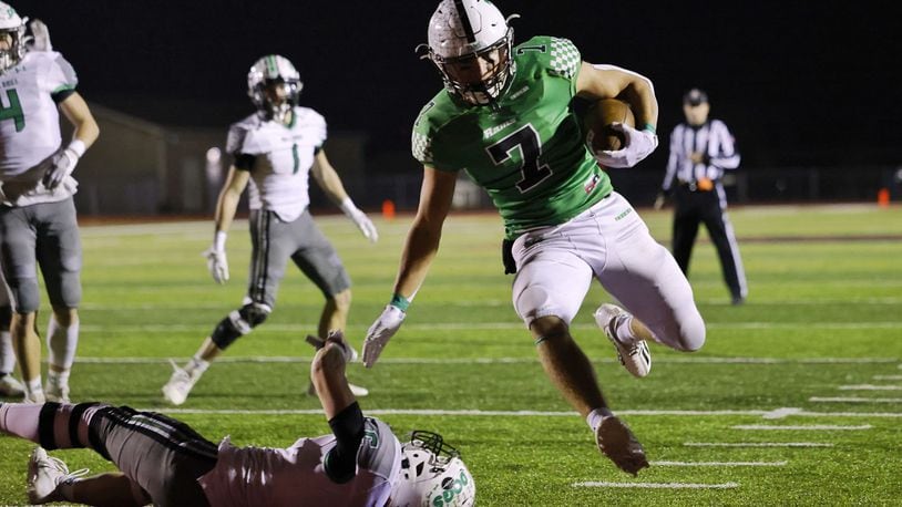 Badin's Zach Yordy runs in for a touchdown during their D-III regional football final against Celina Friday, Nov. 17, 2023 at Trotwood-Madison High School. Celina won 37-25. NICK GRAHAM/STAFF