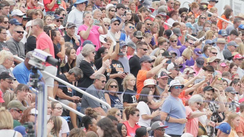 Spectators watch the Division II state track and field meet at Pickerington North High School on Friday, June 4, 2021. David Jablonski/Staff