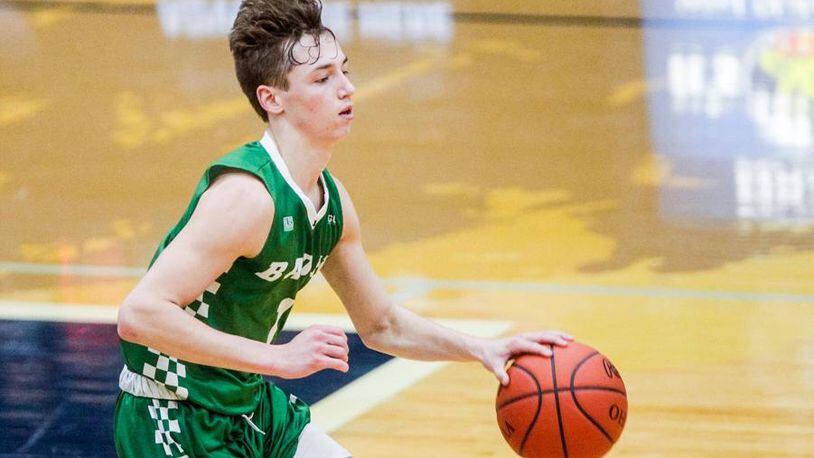 Badin’s Joseph Walsh dribbles down the floor during a 49-46 win at Edgewood on Dec. 28, 2018. NICK GRAHAM/STAFF