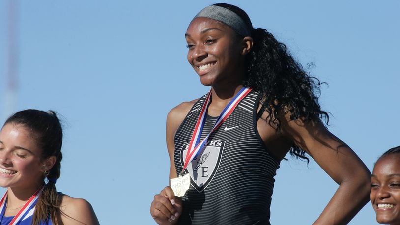 Lakota East's Azariyah Bryant stands atop the podium after winning the 200 at the Division I track championships on Saturday, June 4, 2022, at Jesse Owens Memorial Stadium in Columbus. David Jablonski/Staff