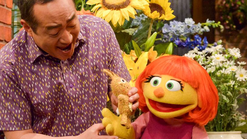 This image released by Sesame Workshop shows Julia, a new autistic muppet character debuting on the 47th Season of "Sesame Street," on April 10, 2017, on both PBS and HBO. (Zach Hyman/Sesame Workshop via AP)