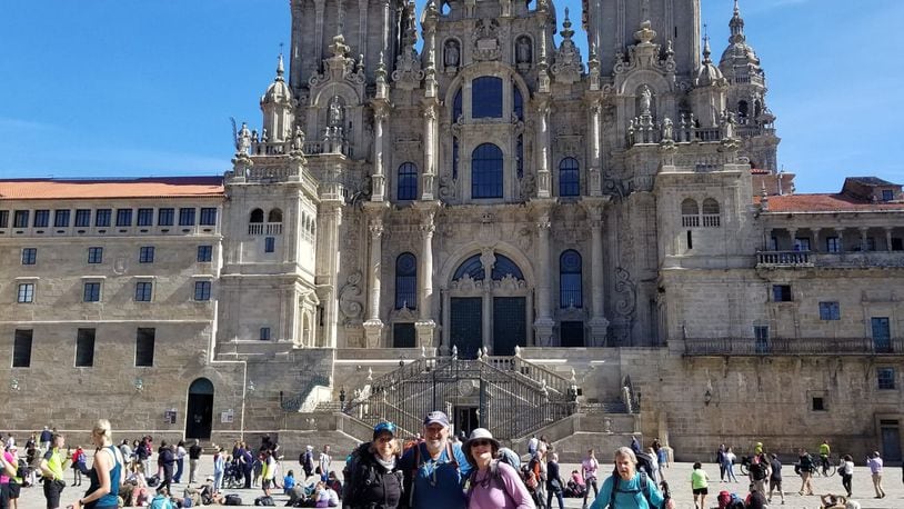 The four friends finish their journey at the Cathedral of Santiago de Compostela. From left: Gail Krentz, Norm Essman and Persis Ellwood. Margie Mahle approaching from rear right. CONTRIBUTED