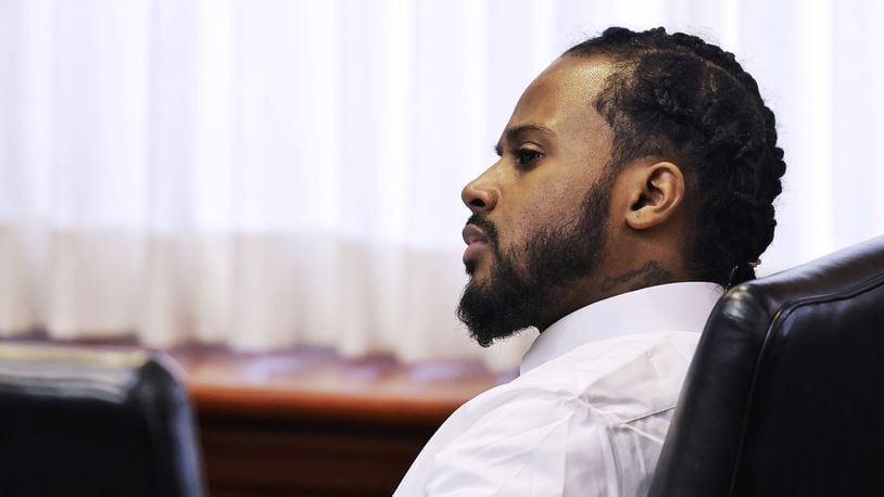 Marquan Cook sits for his trial Tuesday, Dec. 14, 2021 in Butler County Common Pleas Court charged in the shooting death of Brandon Frank Nathanial Moneyham Sr. In 2020 in a parking lot outside the 513 Lounge on Verity Parkway. NICK GRAHAM / STAFF