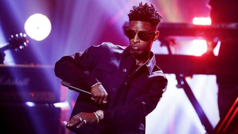 Rapper 21 Savage will serve food to members of a Georgia community on Tuesday.