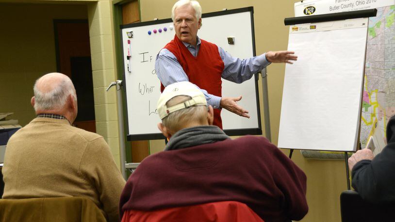 Fairfield Twp. resident Dan Hare facilitates a focus group planning for a township veterans memorial. The group’s plan will be presented to Fairfield Twp. trustees, who will discuss it at a Jan. 11 work session. MICHAEL D. PITMAN/STAFF