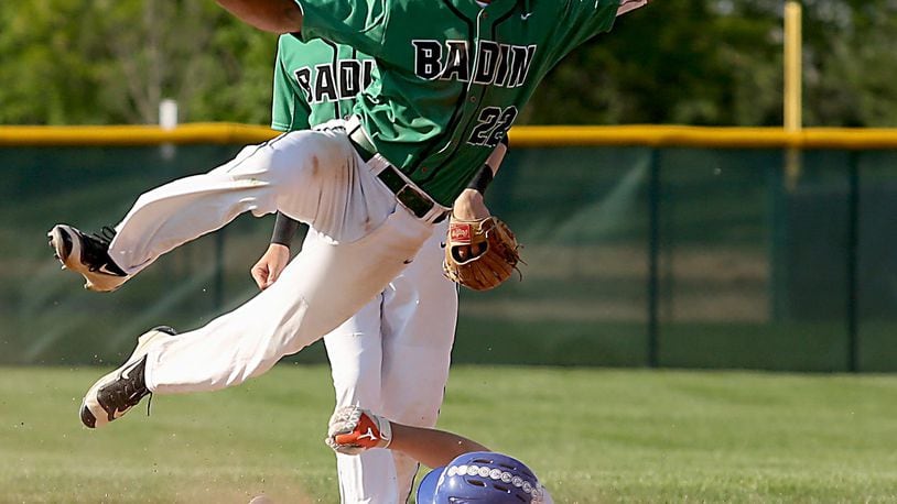 Badin shortstop Daunte DeCello gets the force out on Reading’s Jacob Courtney and throws to first base for a 6-3 double play Sunday during a Division II district baseball final at Mason. CONTRIBUTED PHOTO BY E.L. HUBBARD