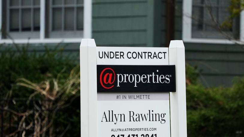 An "Under Contract" sign is displayed at a home in Wilmette, Ill., Thursday, March 28, 2024. On Thursday, April 25, 2024, Freddie Mac reports on this week’s average U.S. mortgage rates. (AP Photo/Nam Y. Huh)