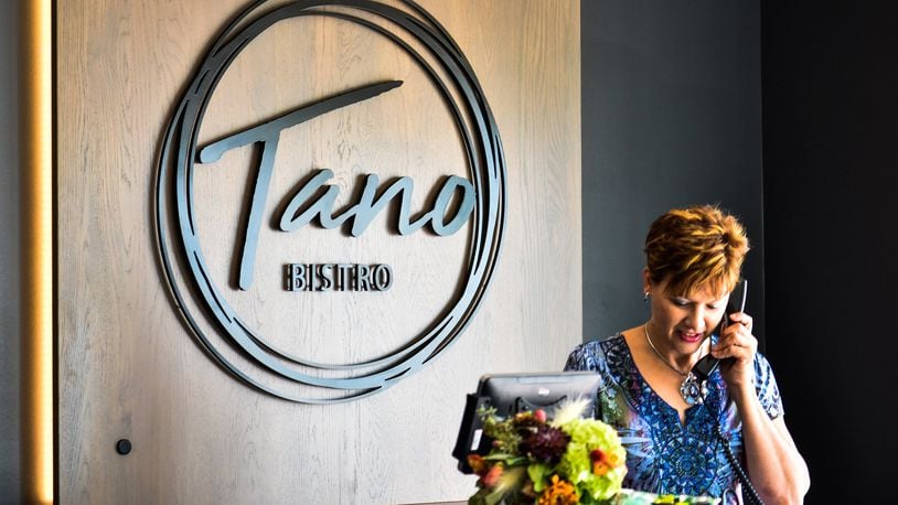 Tano Bistro is now open at 150 Riverfront Plaza on the corner of Dayton Street and Riverfront Plaza in the first floor of The Marcum, a new mixed-used development, in Hamilton. Tano Bistroâ€™s Hamilton location, a 100-seat dining space, will initially open at 4 for but dinner but may expand hours in the future. NICK GRAHAM/STAFF