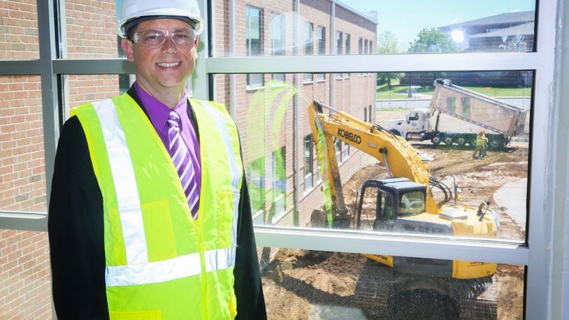 Billy Smith, standing in the new Freshman School under construction, is wrapping up his first year as Superintendent of Fairfield Schools. GREG LYNCH / STAFF