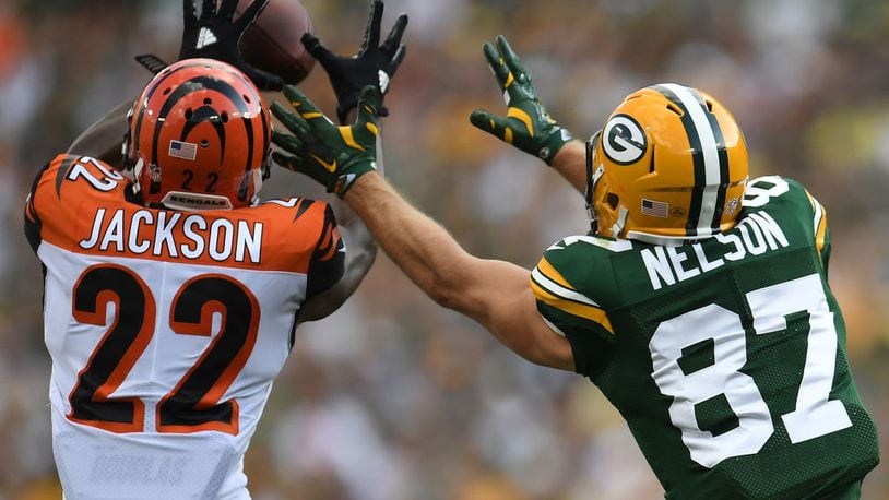 GREEN BAY, WI - SEPTEMBER 24: William Jackson #22 of the Cincinnati Bengals intercepts a pass from Aaron Rodgers #12 (not pictured) to Jordy Nelson #87 of the Green Bay Packers at Lambeau Field on September 24, 2017 in Green Bay, Wisconsin. Jackson returned the interception for a 75-yard touchdown. (Photo by Stacy Revere/Getty Images)