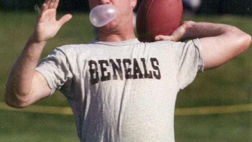 Bengals training camp at Wilmington College. Boomer Esiason blows bubbles while throwing. 7-25-1990