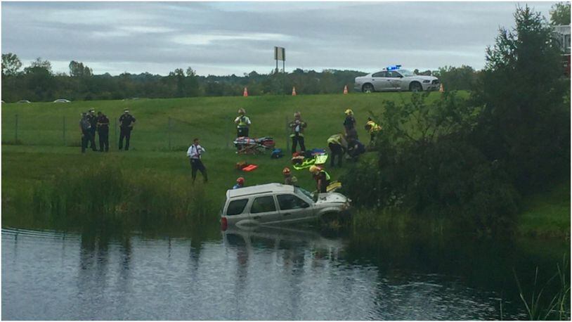 An SUV went into a pond near the Cincinnati Marriott North at around 4 p.m. Tuesday. The driver suffered minor facial injuries, officials said. CONTRIBUTED
