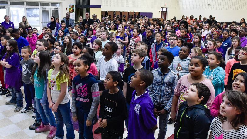 Students sing “Lift Every Voice and Sing” during the 12th Annual Rosa Parks Day Program Friday, Feb. 23 at Rosa Parks Elementary School in Middletown. NICK GRAHAM/STAFF