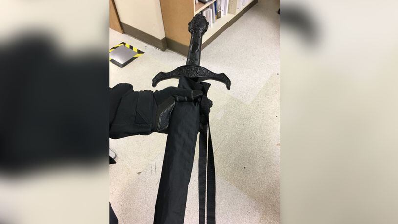 An item carried by a man in a Washington state hospital thought to be a rifle was actually an umbrella with a sword handle.