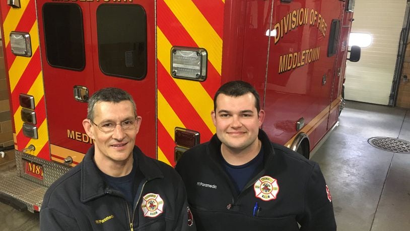 Pawel Mieczykowski, left, and his son, Michael, worked together as paramedics this week at the Middletown Division of Fire. This was the first time they had worked on the same shift, a rare practice for relatives.