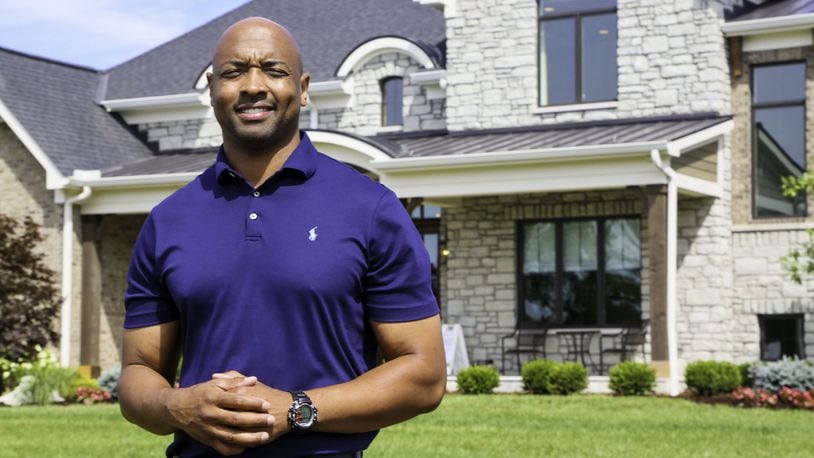 Andrew Frazier stands in front of The Stonewood at the new Highlands at Heritage Hill development in Union Twp. during Homearma, the nation’s oldest luxury home showcase, on July 19, 2018. Frazier was the first African American featured in Homearama’s 55-year history. GREG LYNCH / JOURNAL-NEWS