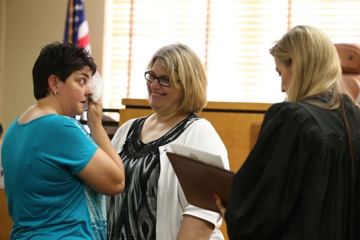 High Court OKs gay marriage; Travis begins issuing licenses
