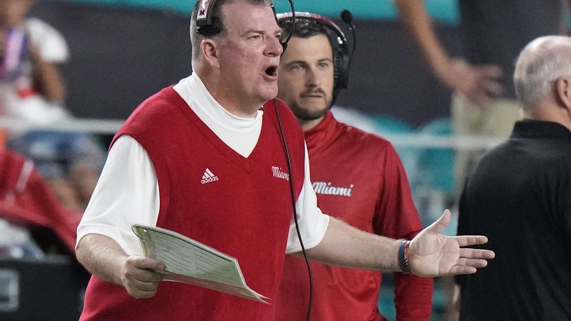 Miami (Ohio) head coach Chuck Martin calls out a play during the first half of an NCAA college football game against Miami, Friday, Sept. 1, 2023, in Miami Gardens, Fla. (AP Photo/Wilfredo Lee)