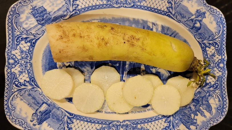Daikon is a white radish that is much larger than the familiar red globe-shaped radish, and shaped differently. CONTRIBUTED