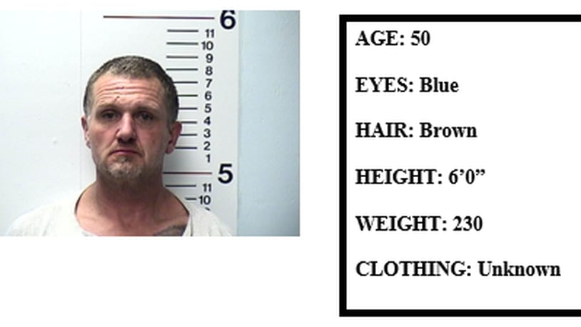Michael Bowlin Sr., 50, who was also wanted on a burglary charge, was not found at the house.