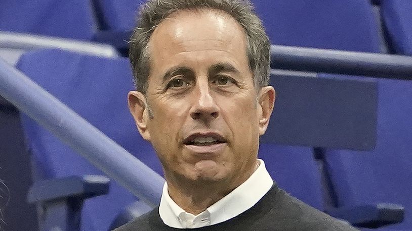 FILE - Jerry Seinfeld is shown before the men's singles final of the U.S. Open tennis championships between Casper Ruud, of Norway, and Carlos Alcaraz, of Spain, Sunday, Sept. 11, 2022, in New York. Seinfeld's upcoming Netflix comedy will be featured during this weekend's IndyCar race at Long Beach as rookie Linus Lundqvist will drive a car painted to look like a Pop-Tart in recognition of the movie “Unfrosted.”(AP Photo/John Minchillo, File)