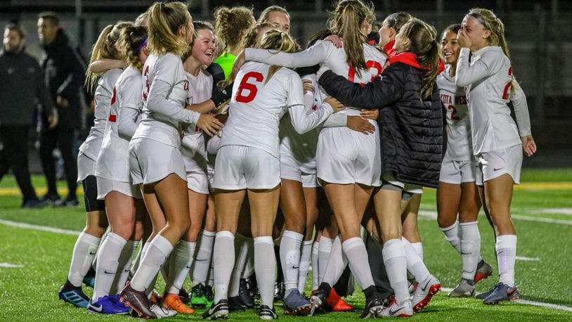 The Lakota West High School girls soccer team celebrates after beating Dublin Coffman 2-1 in a Division I state semifinal match on Tuesday night at Springfield High School. The unbeaten Firebirds (21-0-2) will play Whitehouse Anthony Wayne in the state final at 7 p.m. Saturday at MAPFRE Stadium in Columbus. CONTRIBUTED PHOTO BY MICHAEL COOPER