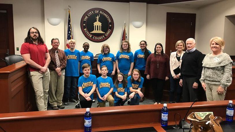 Students from Hamilton Schools’ Brookwood Elementary recently presented their Lego engineering project to city and county officials in the city council chambers. The 5th and 6th graders, who designed a plan to better alert drivers in the Butler County city when a train may be traveling through downtown, impressed the officials who praised their work. (Provided Photo/Journal-News)