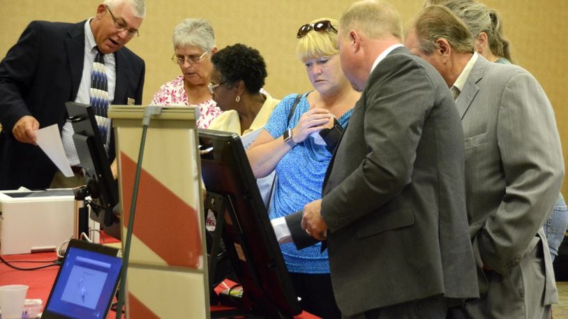 A couple hundred people came to the Butler County Board of Elections office on Wednesday, July 26, 2017, to test out six voting machines from five vendors. The elections office is looking to replace its machines from 2005, but the price tag could be cost taxpayers between $3 million and $6 million. MICHAEL D. PITMAN/STAFF