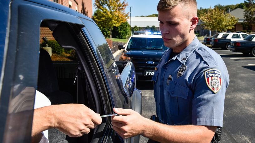 Cody Baker, who is part of the Fairfield Police Department’s Explorer program, practices a traffic stop at the Fairfield Police Department. The Fairfield Explorers is a cadet program for students ages 14-21 to learn about what it is like to be a police officer. NICK GRAHAM/STAFF