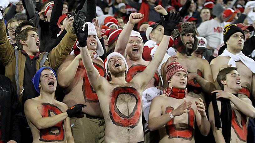 Contributed photo by E.L. Hubbard Bare-chested Miami students react as the Miami RedHawks beat Ball State, for their sixth straight win, at Yager Stadium in Oxford Tuesday, Nov. 22, 2016.