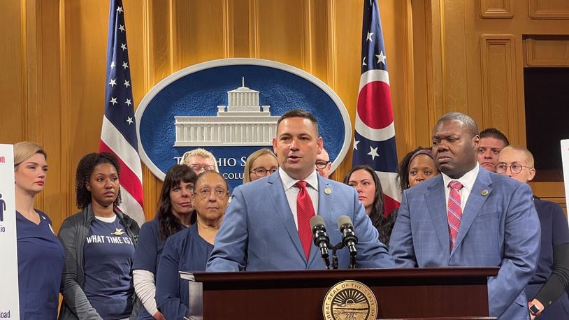 Ohio Rep. Haraz Ghanbari, R-Perrysburg, (front center), along with with Ohio Rep. Elgin Rogers, Jr. (D-Toledo, front right) and Ohio nurses pictured behind them, introducing proposed legislation that would implement nurse-to-patient ratios at Ohio hospitals. CONTRIBUTED