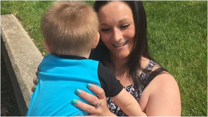 Megan Franken, 26, of Hamilton, has been addicted to heroin for the past seven years. She was granted legal custody of her 13-month-old son this week. The single mother, who twice has lost custody of her son due to her drug addiction, said she’s done with heroin now and forever. RICK McCRABB/STAFF