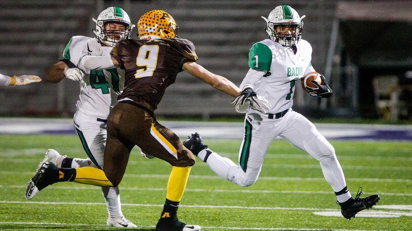 Badin’s Davon Starks carries the ball during a Division III, Region 12 semifinal against Alter on Nov. 9 at Barnitz Stadium in Middletown. Alter won 13-0. NICK GRAHAM/STAFF