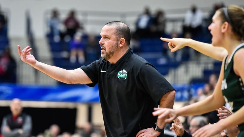 Mason girls basketball coach Rob Matula stands on the sideline during their Division I girls Regional basketball final against Lakota West Saturday, March 10 at Fairmont High School's Trent Arena in Kettering. Mason won 54-51. NICK GRAHAM/STAFF