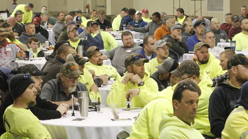 Area utility workers attend a Safe Dig breakfast and demonstration Wednesday at the Greene County Fairgrounds & Expo Center. CHRIS STEWART / STAFF