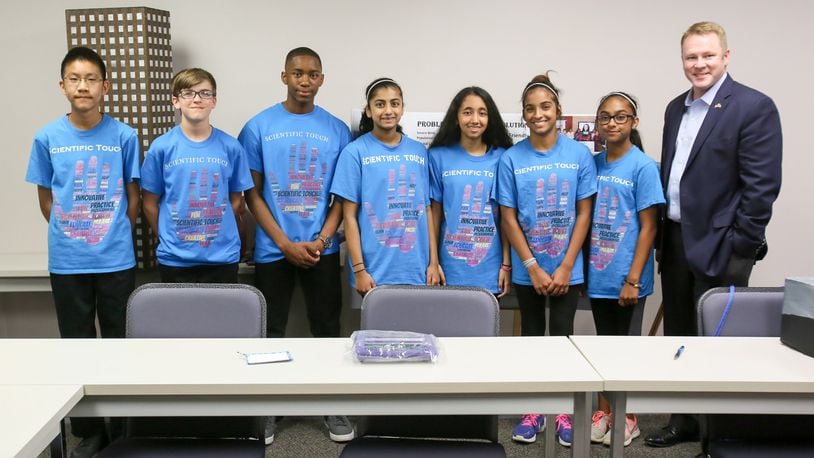 Middle school students from Lakota and other area districts that are part of the Scientific Touch team, met with Congressman Warren Davidson, Thursday, Apr. 20, 2017, at his office, to demonstrate their project before traveling to St. Louis for the world Lego science project championship. GREG LYNCH / STAFF