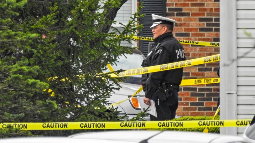 West Chester Police investigate at the scene where four people were found dead with apparent gunshot wounds inside an apartment at Lakefront at West Chester apartment complex on Wyndtree Drive in West Chester Township Monday, April 29, 2019. NICK GRAHAM/STAFF