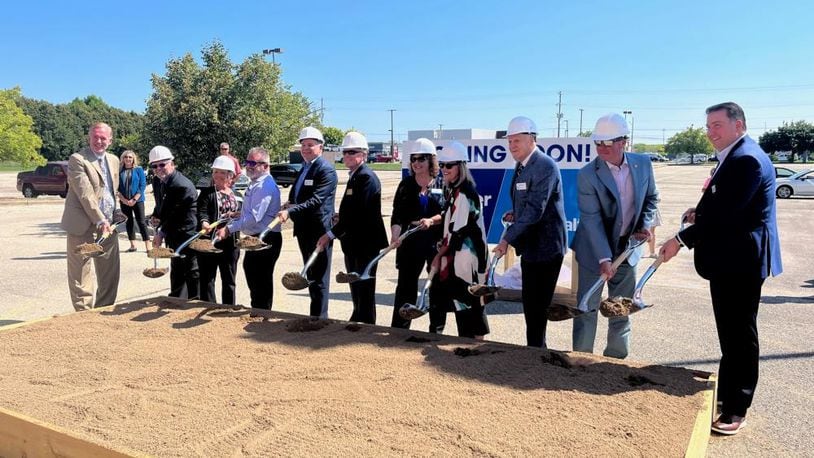 Officials from Kroger, Reid Health and city of Eaton held a ceremony Monday for a new Kroger store in Eaton. CONTRIBUTED