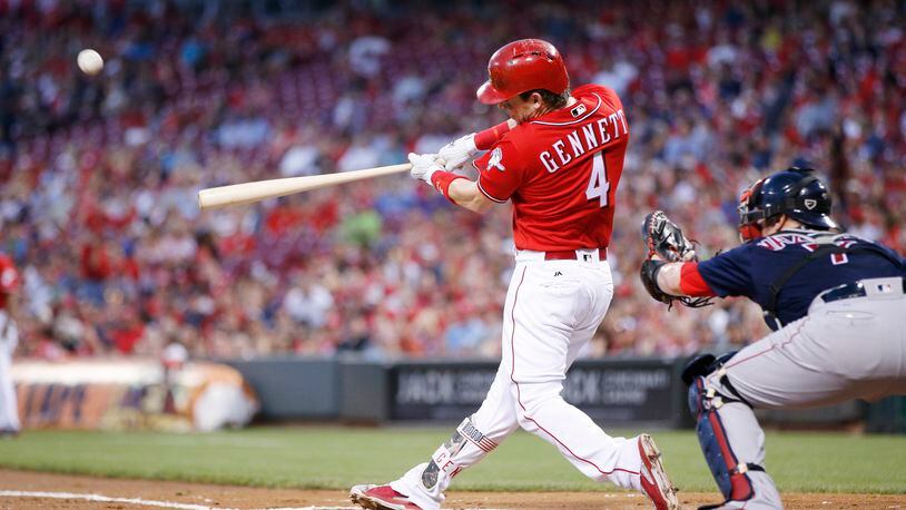 CINCINNATI, OH - SEPTEMBER 22: Scooter Gennett #4 of the Cincinnati Reds hits a grand slam home run in the first inning of an interleague game against the Boston Red Sox at Great American Ball Park on September 22, 2017 in Cincinnati, Ohio. (Photo by Joe Robbins/Getty Images)