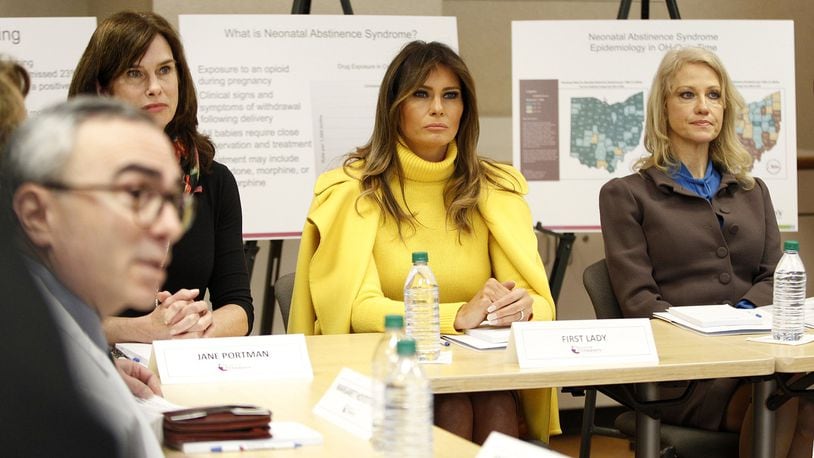 First Lady Melania Trump, Jane Portman, wife of Sen. Rob Portman, and Kellyanne Conway, counselor to the president, take part in an informational gathering on the opioid crisis at Cincinnati Children’s Hospital Monday. LISA POWELL/STAFF