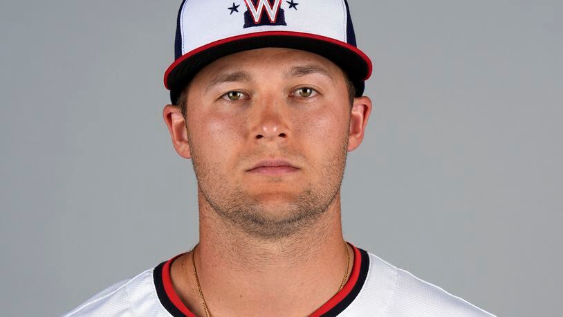 FILE - This is a 2024 photo of Nick Senzel of the Washington Nationals baseball team. Senzel was scratched from the opening day lineup after breaking his thumb during batting practice Thursday, March 28, 2024, manager Dave Martinez said. (AP Photo/Jeff Roberson, File)