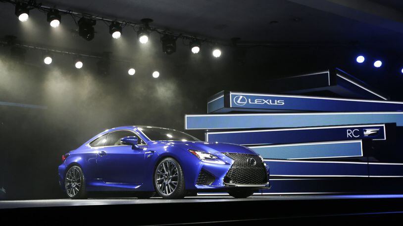 In this file photo, the Lexus RC F Coupe is unveiled at the at the North American International Auto Show in Detroit. Technology glitches including Bluetooth phone pairing and misunderstood voice commands dented car and truck reliability scores in a major survey of automobile owners. Lexus and Porsche tied for the top spot, leading all brands for dependability in the survey released Feb. 22 by the consulting firm J.D. Power.(AP Photo/Carlos Osorio, File)