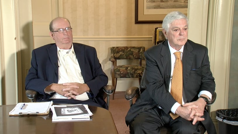 Former Village of Morrow employee Tim Erwin and his attorney Jim Whitaker. LOT TAN / WCPO-TV